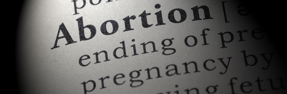 Photo: Dictionary definiton of abortion